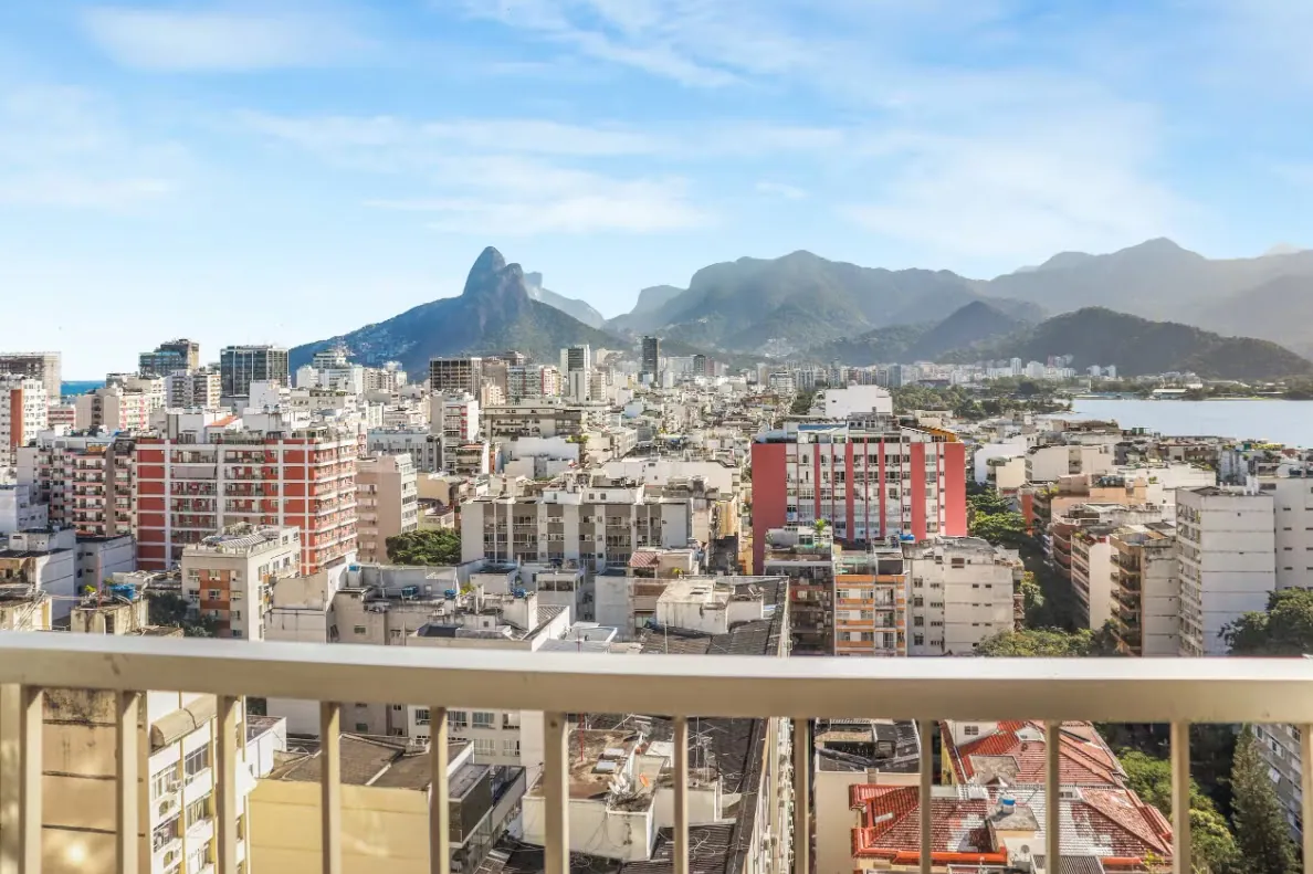 View from an Ipanema apartment balcony over the neighborhood to the Lagoa and the Dois Irmãos