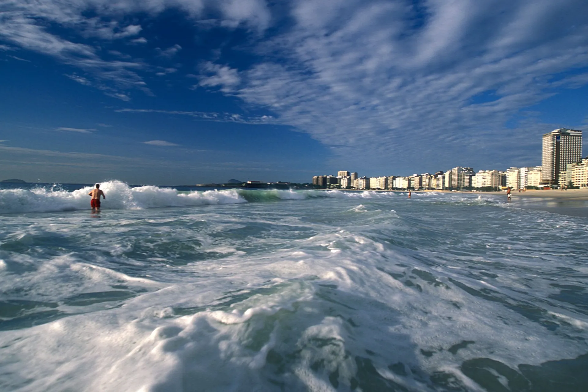Copacabana beach seen from the promenade in golden hour